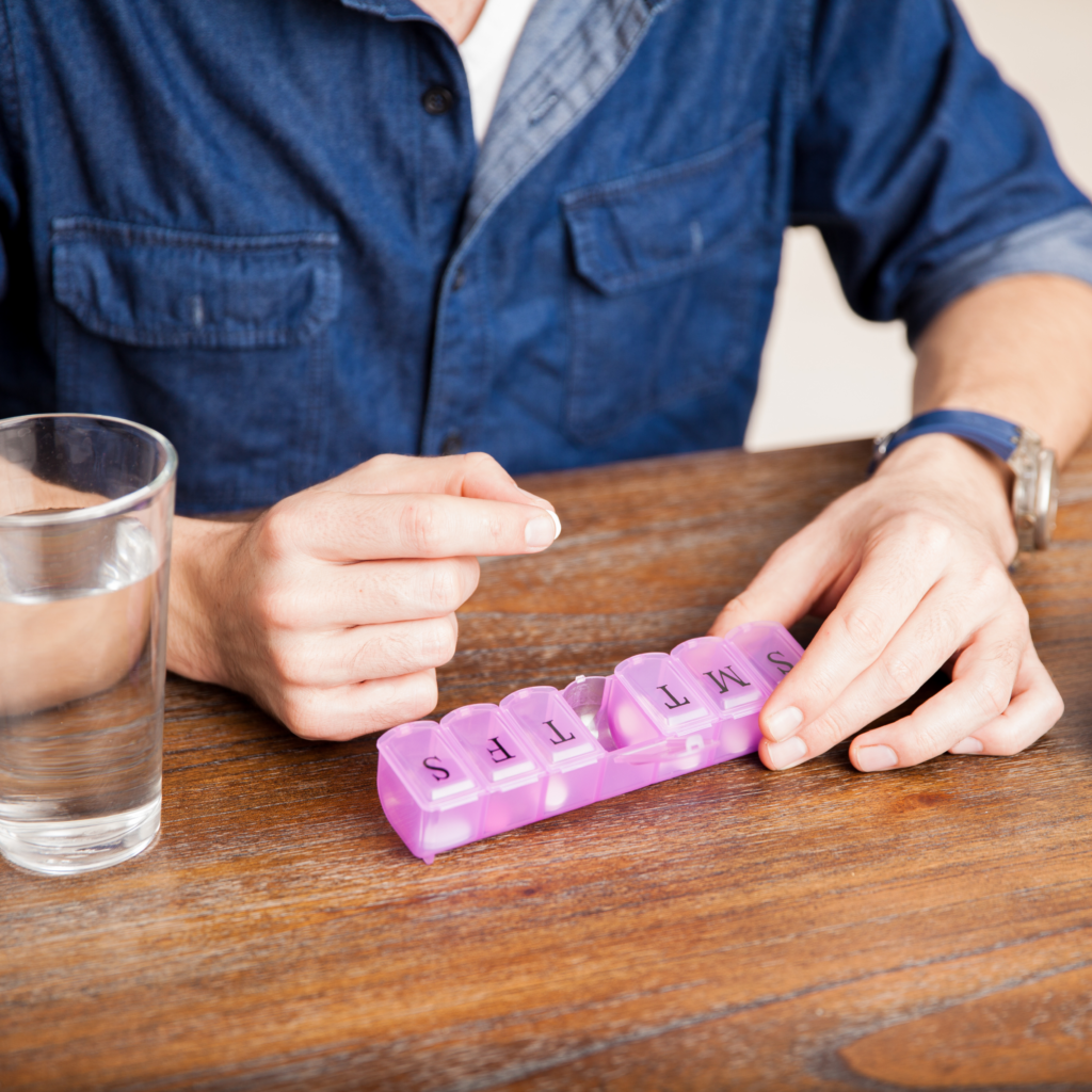 man taking vitamins - Seaflora Skincare