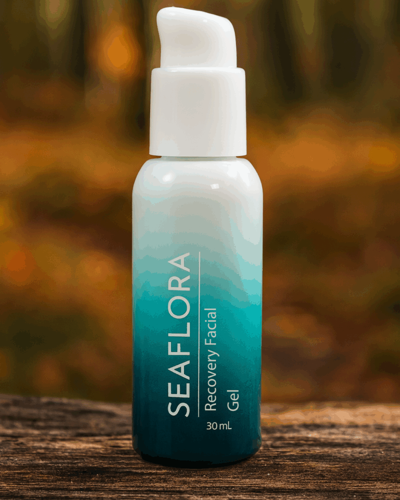 Seaflora Recovery Facial Gel: A Soothing Autumn Glow - Seaflora Skincare A jar of Seaflora's Recovery Facial Gel sits on a rustic wooden surface. The background is a warm, out-of-focus blend of orange and brown, evoking the feeling of autumn.